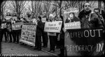 Human rights activists protest during President Aliyev’s visit to Berlin